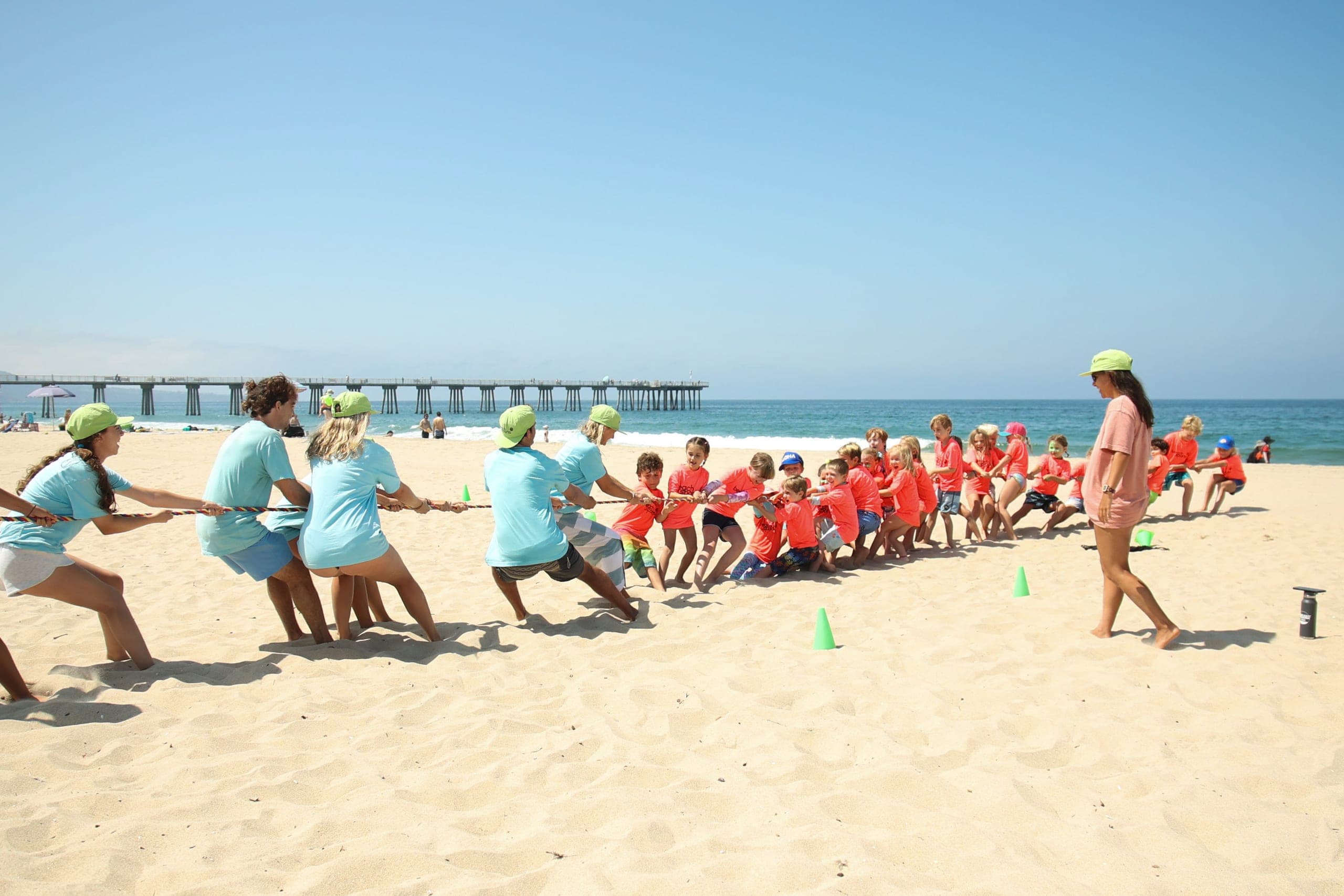Campers playing a sand game together