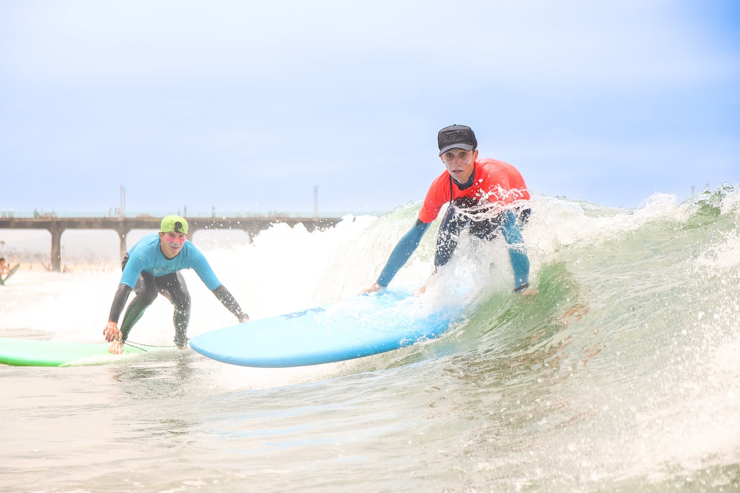 Campers celebrating after a surf session